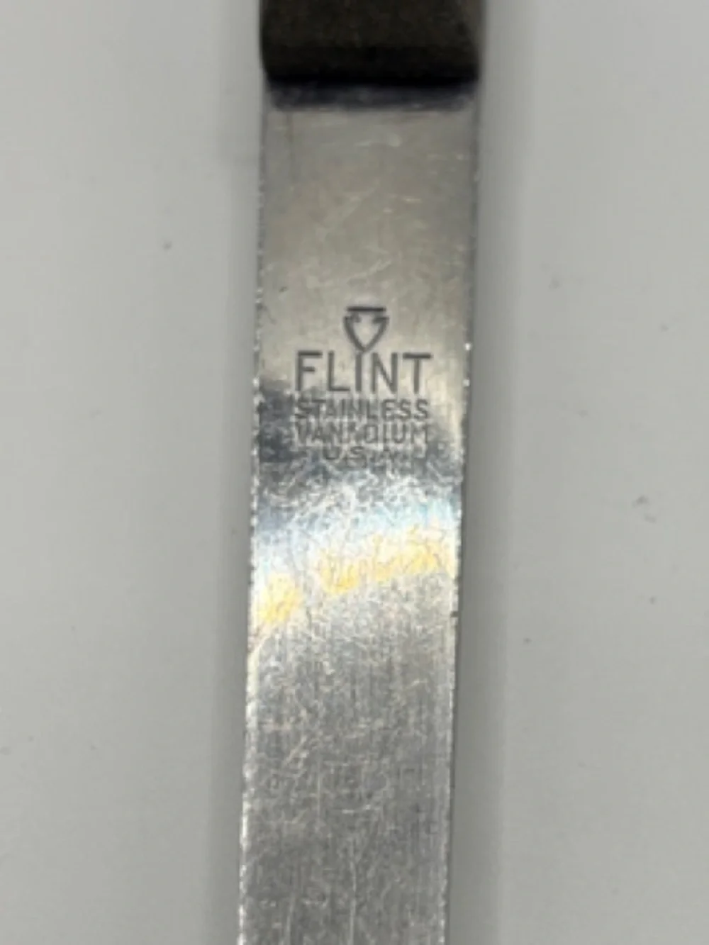 Ekco Flint Vanadium Stainless Serving Ladle with Dark Brown Handle